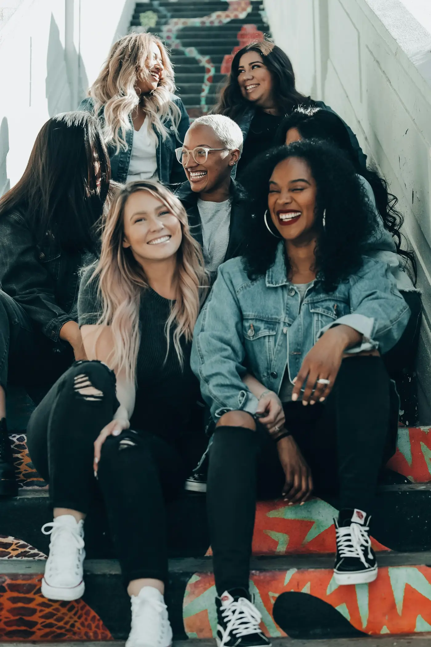 A joyful group of women laughing together